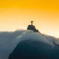 Sunset and dusk over the Christ Statue in Rio De Janeiro, Brazil