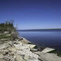 Rocky Shoreline of Lake Winnipeg with clear sky at Hecla Provincial Park