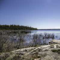 Overlooking the lake landscape under blue skies on the Ingraham Trail
