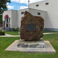 Timmins Chamber of Commerce with Rock and Plaque in Ontario, Canada