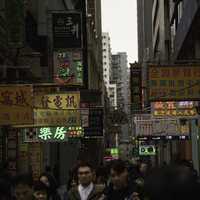 Streets, people, and towers in Macau