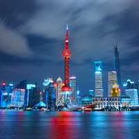 Night Skyline with bright lights in Shanghai, China
