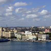 Skyline and cityscape under sky and clouds in Havana, Cuba