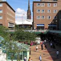 Coventry precinct with spire of ruined cathedral in the background
