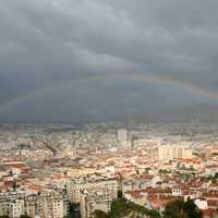 Rainbow over the cityscape of Marseille
