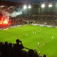 Flares of the Roazhon Celtic Kop at the Roazhon Park in Rennes, France