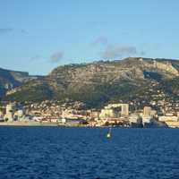 View of Toulon, the Arsenal and Mount Faron from the Harbour in France