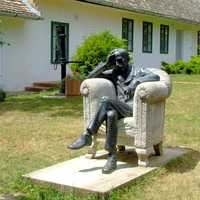 Babits Memorial House with man sitting in chair in Szekszárd, Hungary