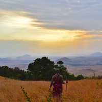 Tribesman looking at the landscape of Kenya