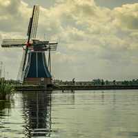Windmill by the shoreline in the Netherlands