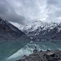 Hooker Lake landscape with clouds and fog with mountains in New Zealand