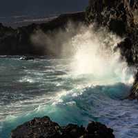 Ocean waves crashing on rocky shores