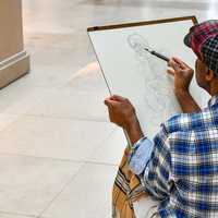artist-doing-a-sketch-on-a-canvas