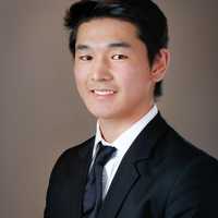 handsome-young-asian-in-a-suit