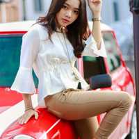 pretty-young-girl-on-red-car