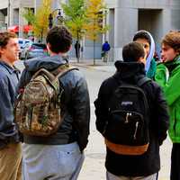 some-students-standing-on-as-street-corner