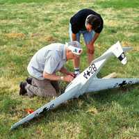 two-men-fixing-a-me-323-glider