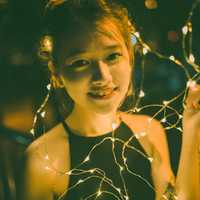 Young Girl with Black Dress with lights