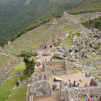 Tourists visiting the Ruins of Machu Picchu, Peru
