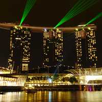 Laser Lights from the night towers in Singapore