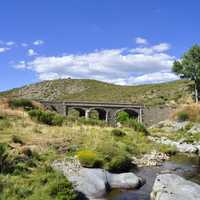 Bridge and stream and landscape in Spain