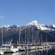 Boats in the harbor and Mountains in the Landscape in Seward, Alaska