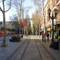 Downtown San Jose sidewalk in San Jose, California with trees and buildings