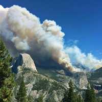 Meadow wildfire in the landscape of Yosemite Valley, California