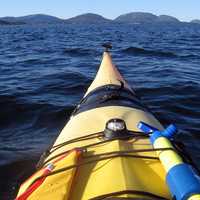Canoeing on the waters of Acadia National Park, Maine