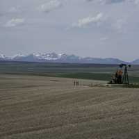 Farm Machinery with mountains in the background in Montana