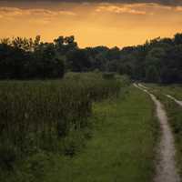 Hiking path into the red sunset at Horicon Marsh
