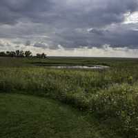 Pond and Field under heavy clouds at Horicon Marsh