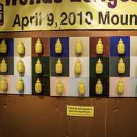 Mustard Bottle on the wall in National Mustard Museum