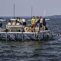 People standing on the pier at swimming in Lake Mendota, Wisconsin