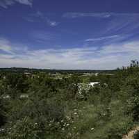 Trees, town, landscape, and sky overlook in New Glarus