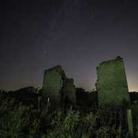 Night Stars in the Sky above Ruins House