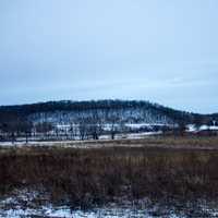 Landscape and hills under overcast sky in Wisconsin