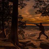 Punching stance at dusk at Gibraltar Rock, Wisconsin Free Stock Photo