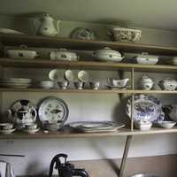 Kitchen with plates on shelves