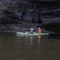 Two people rowing down the Wisconsin River