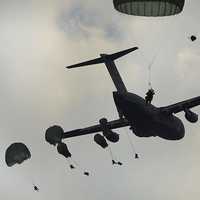 Airborne Paratroopers being dropped from a C-17