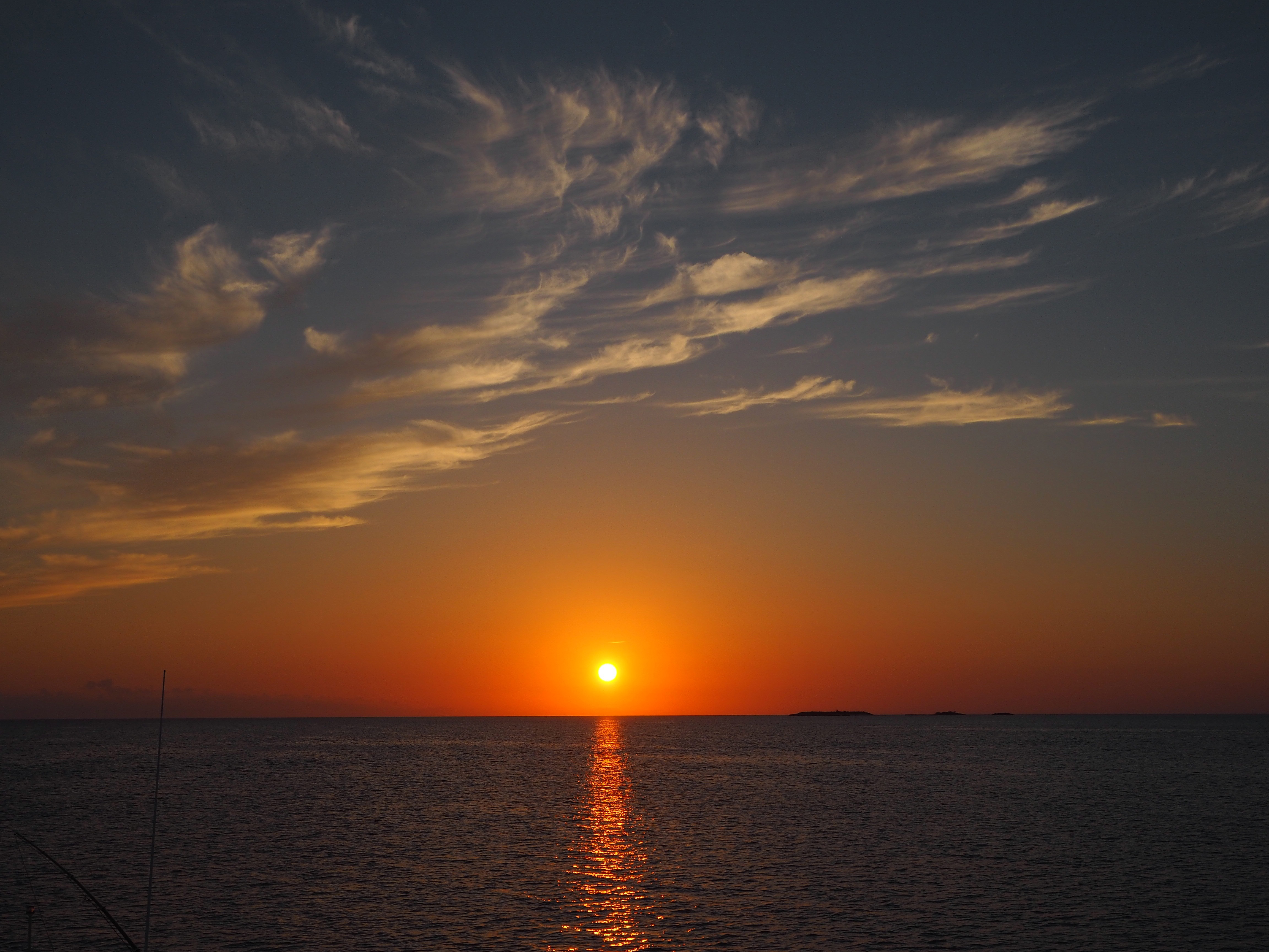 Sunset Over The Ocean Waters Under Clouds In The Bahamas Image Free