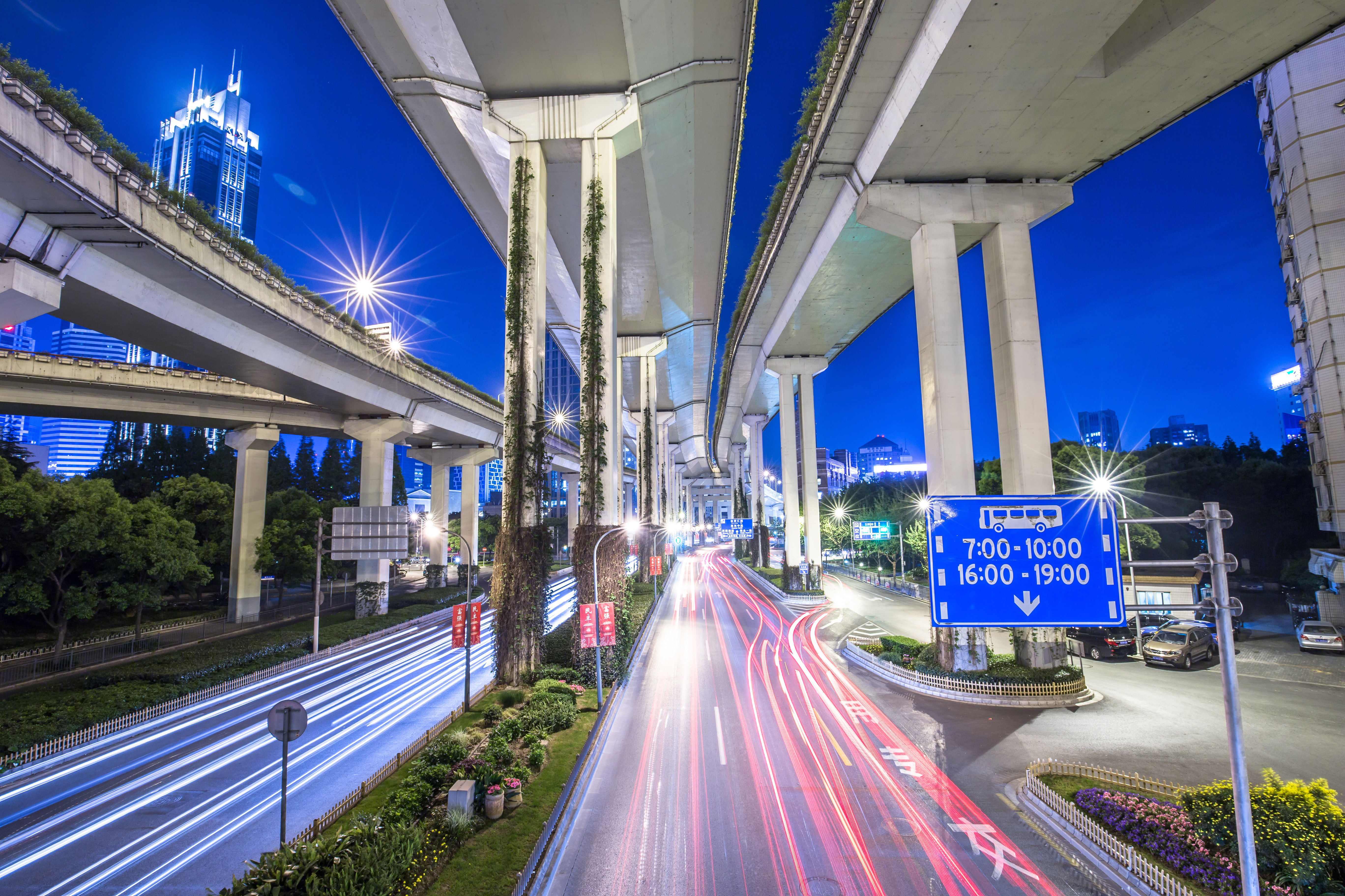 highway-bridges-with-lights-at-night-in-shanghai-china.jpg