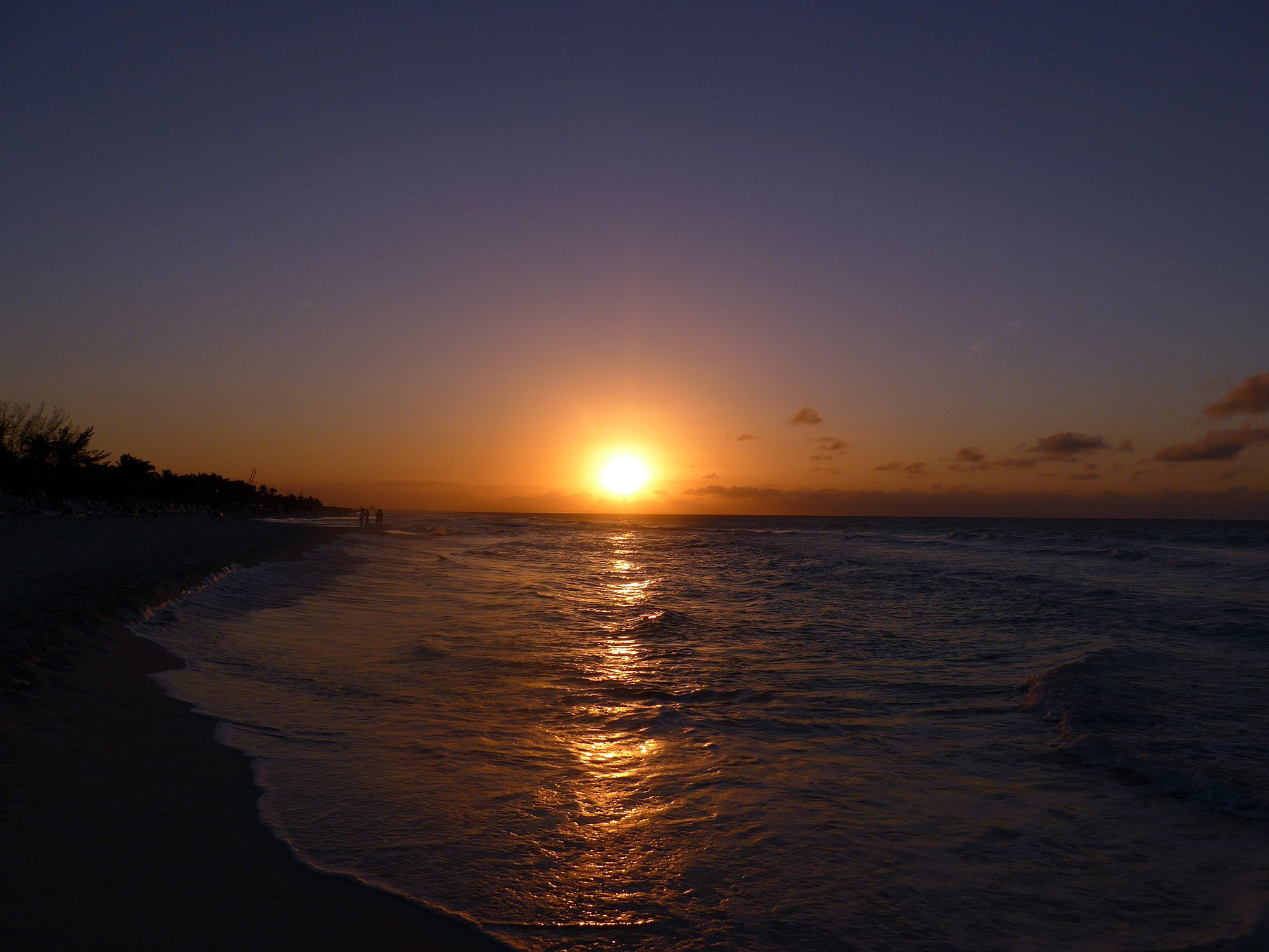 sunset-over-the-ocean-with-purple-sky-cuba.jpg