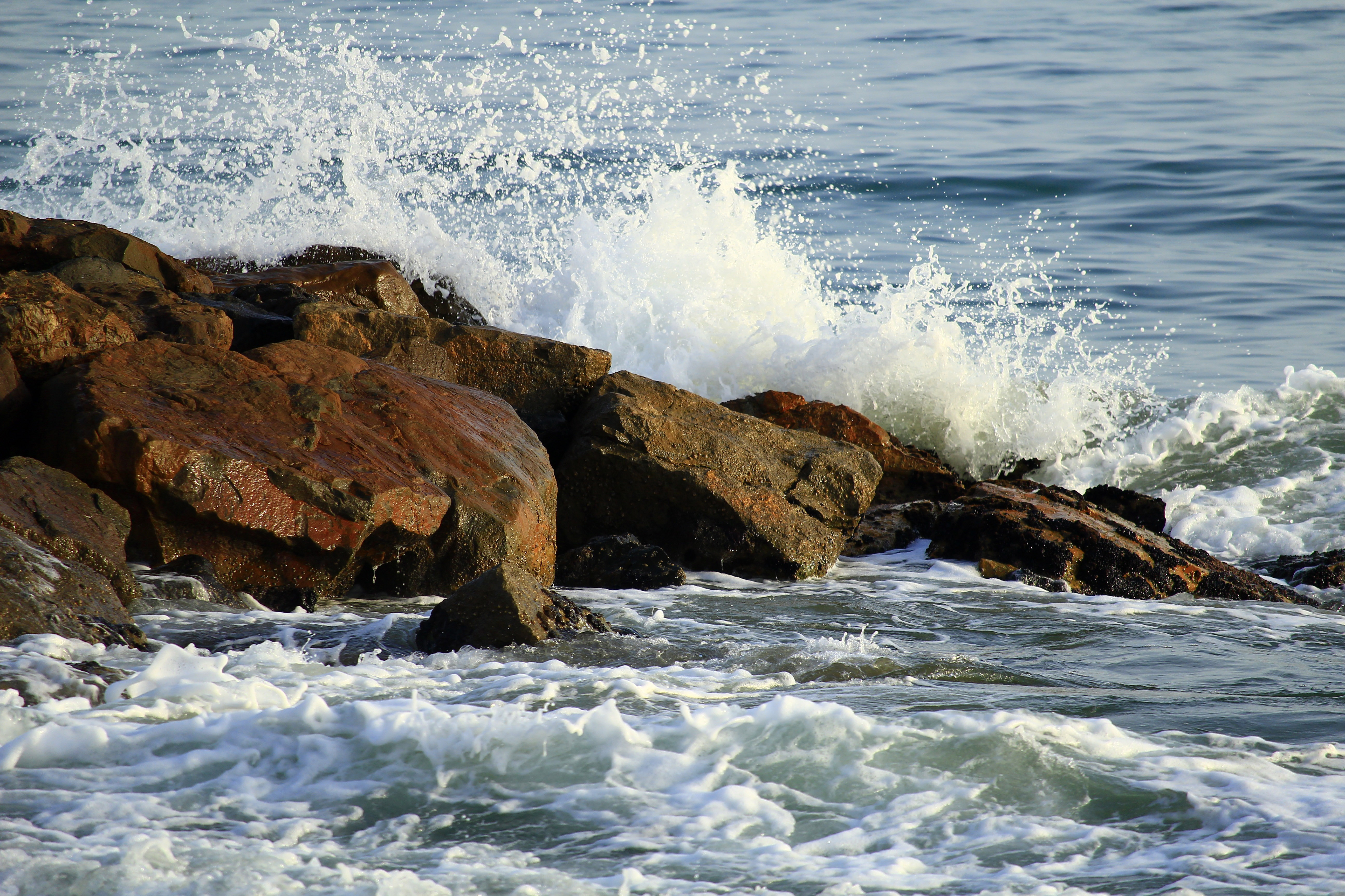 Waves Crashing On Rocks