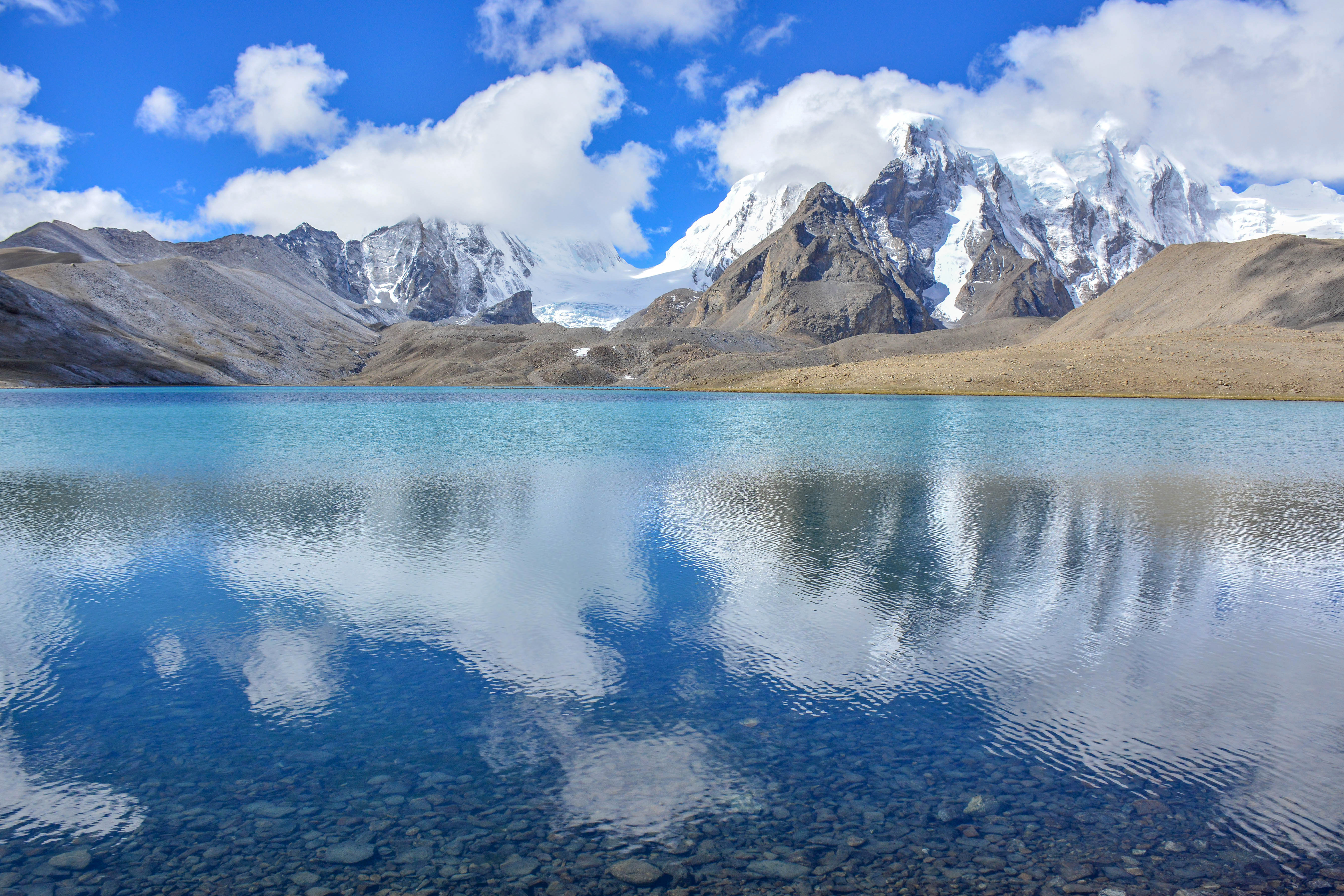 Landscape with mountains, clouds, and lake in India image ...