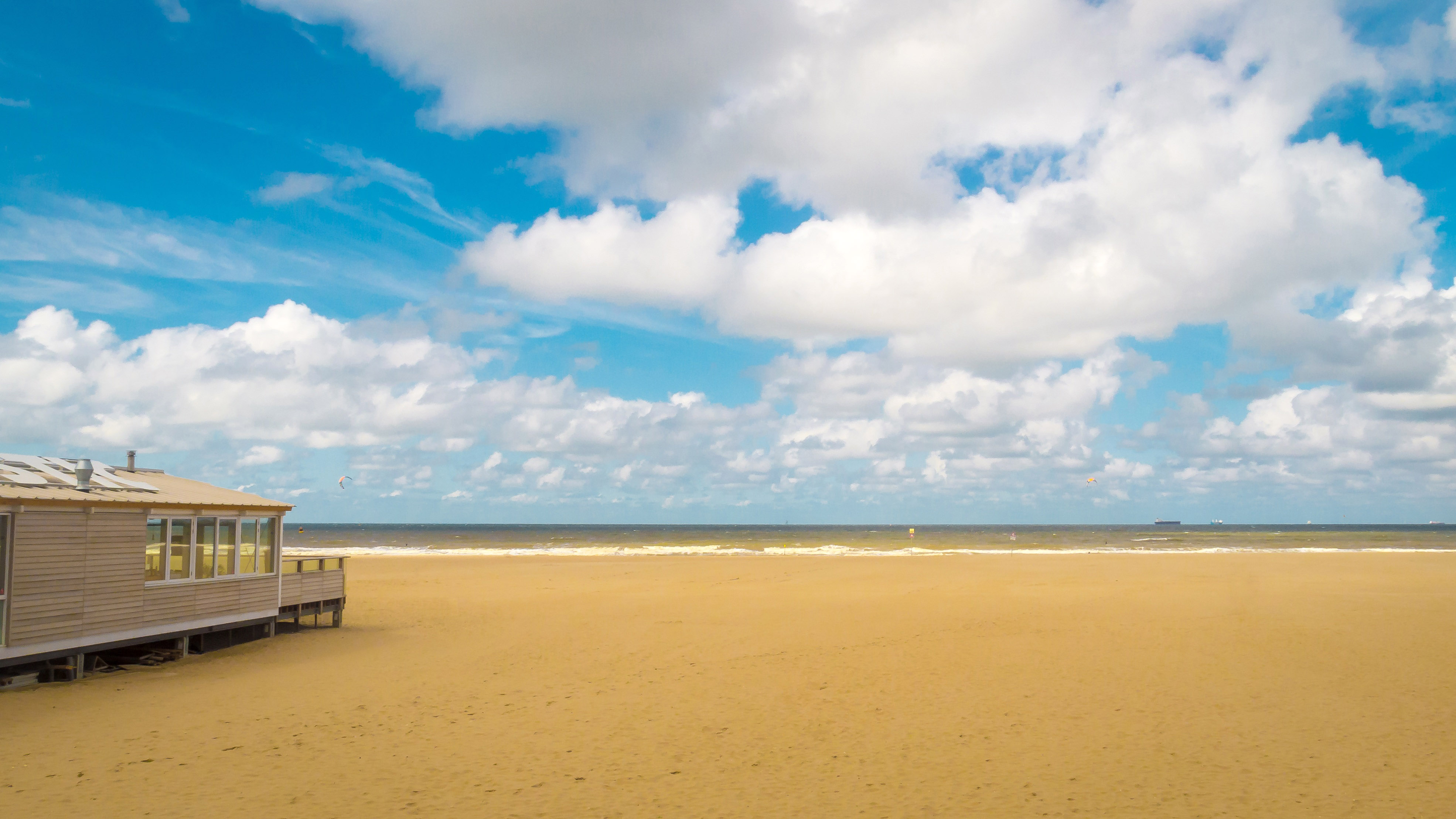Beautiful beach landscape under the sky and clouds in The Hague