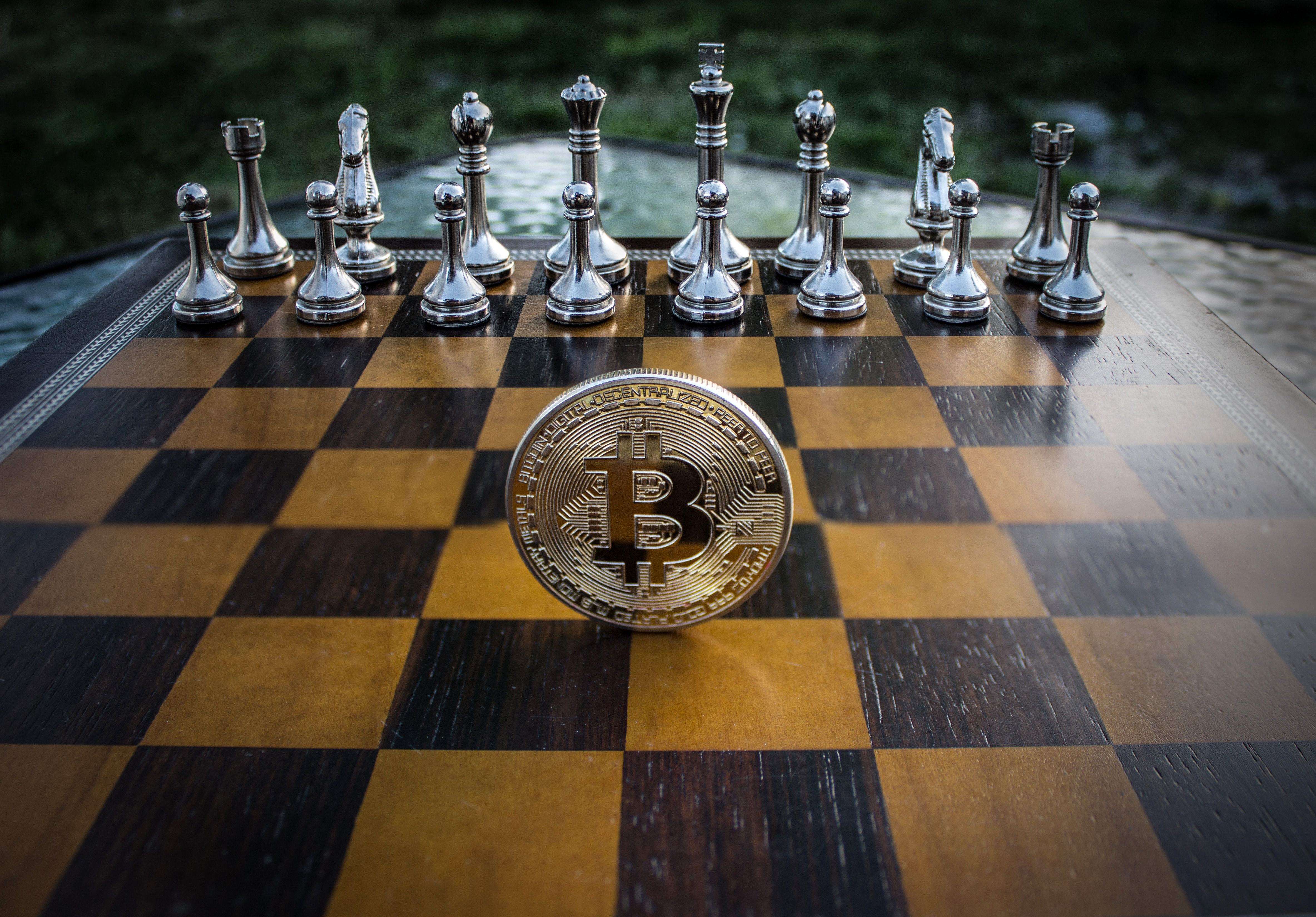 Bitcoin standing on a chess board image - Free stock photo - Public Domain photo - CC0 Images