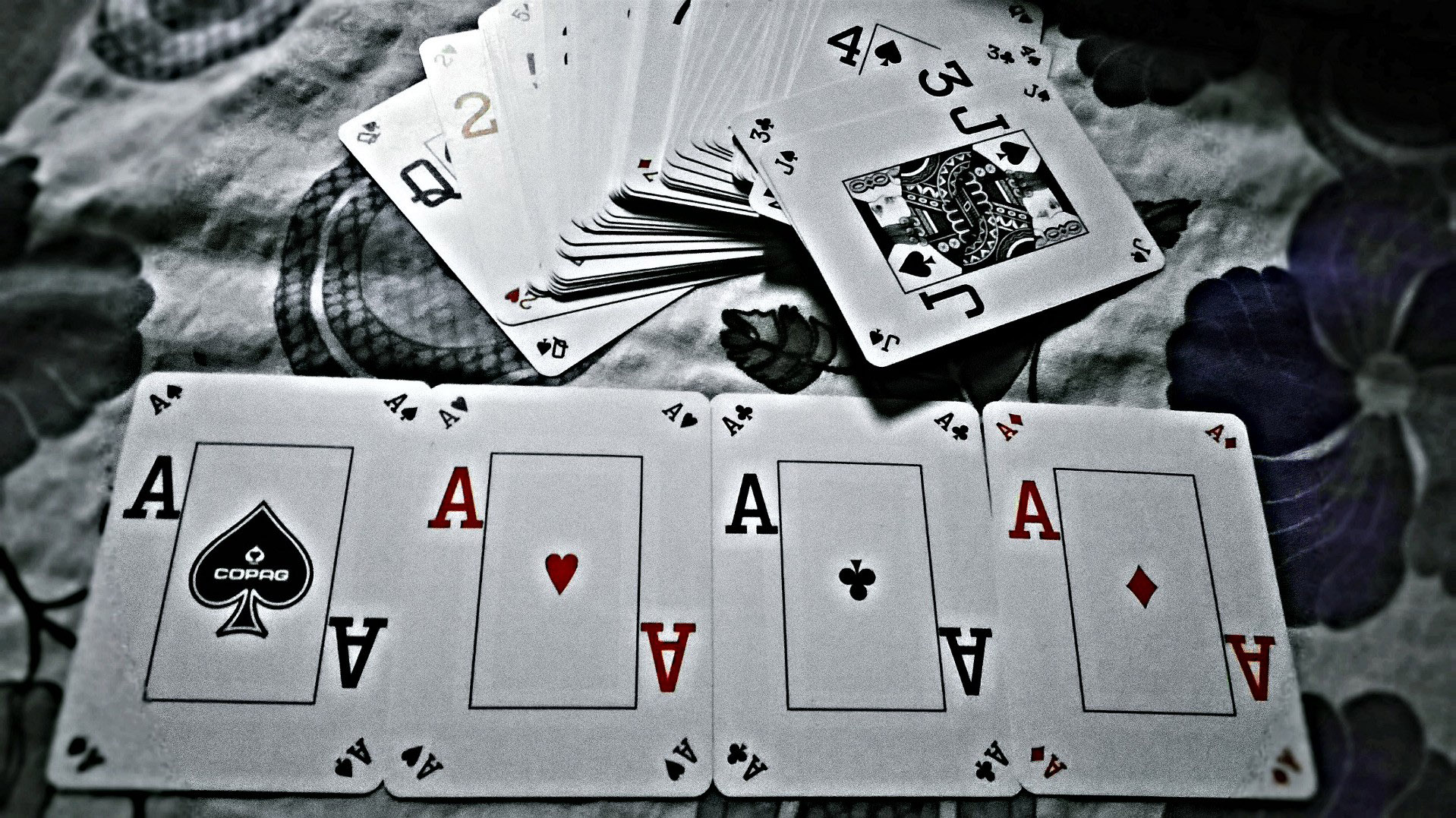 four-aces-from-a-deck-of-cards.jpg