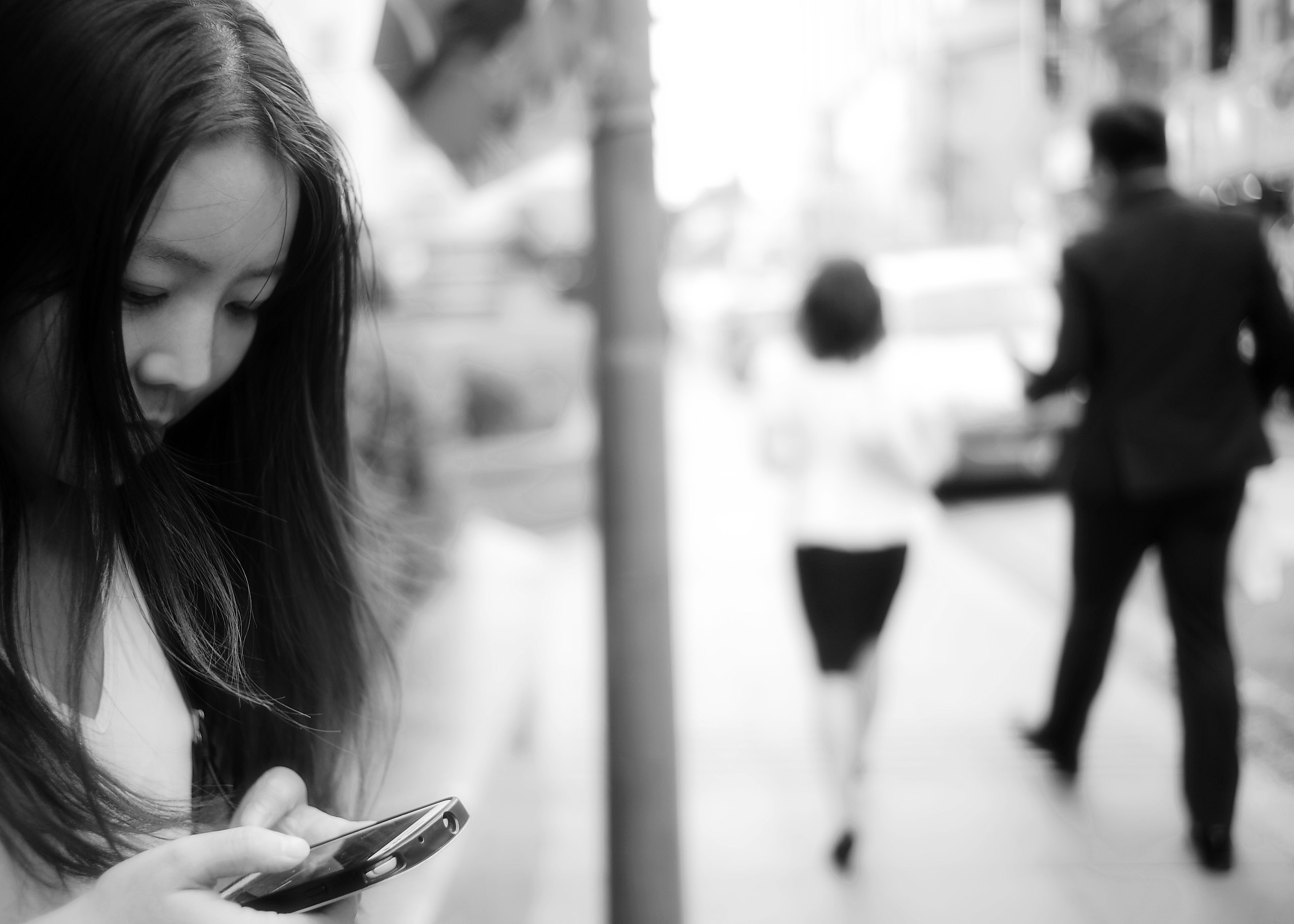 Free Stock Photo of Asian Women texting on the phone 